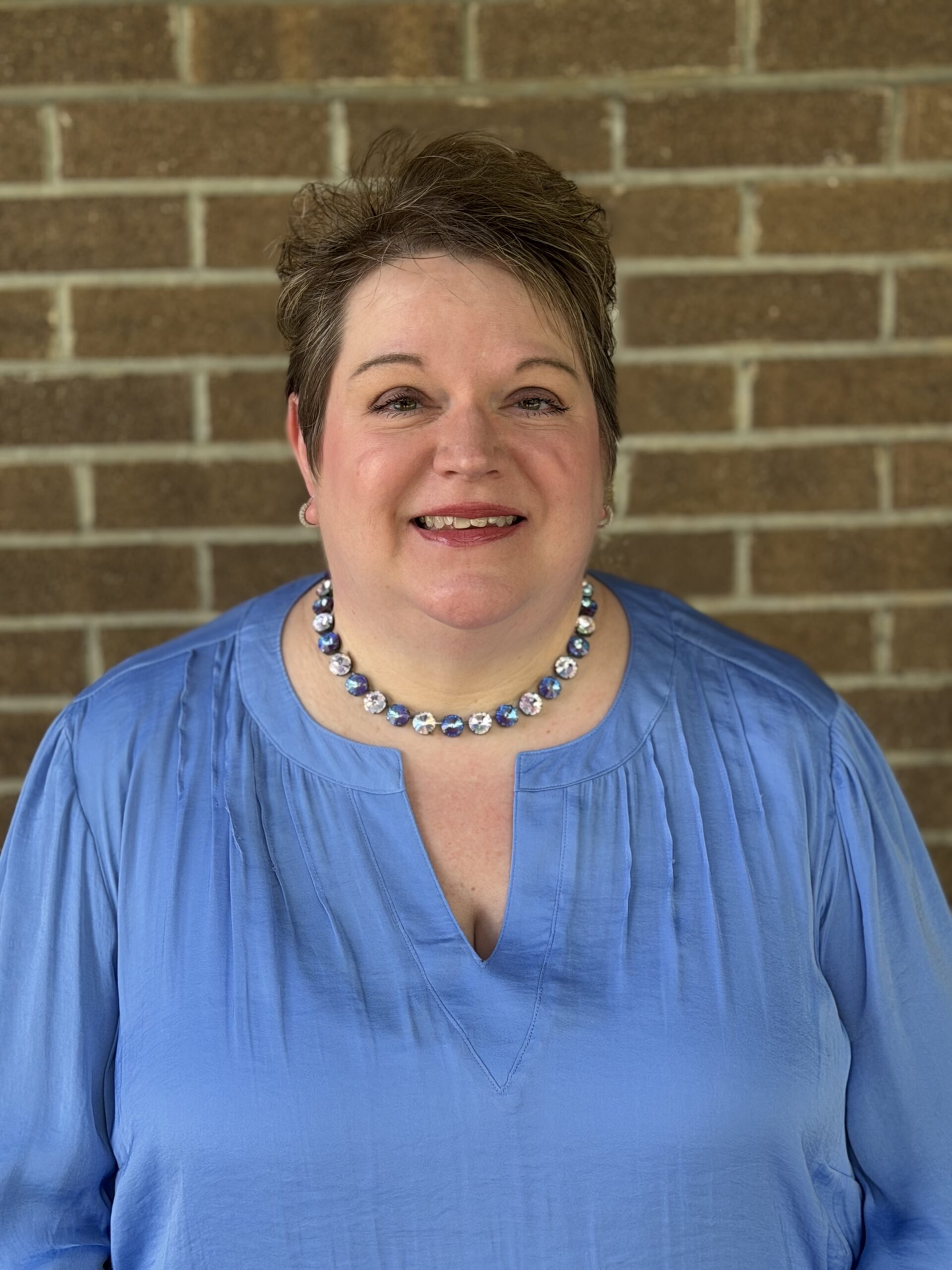 Kerry Ayres — Director of Finance and Administration